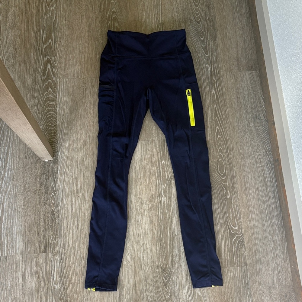Fabletics Navy Leggings with Highlighter Yellow Zipper Accents